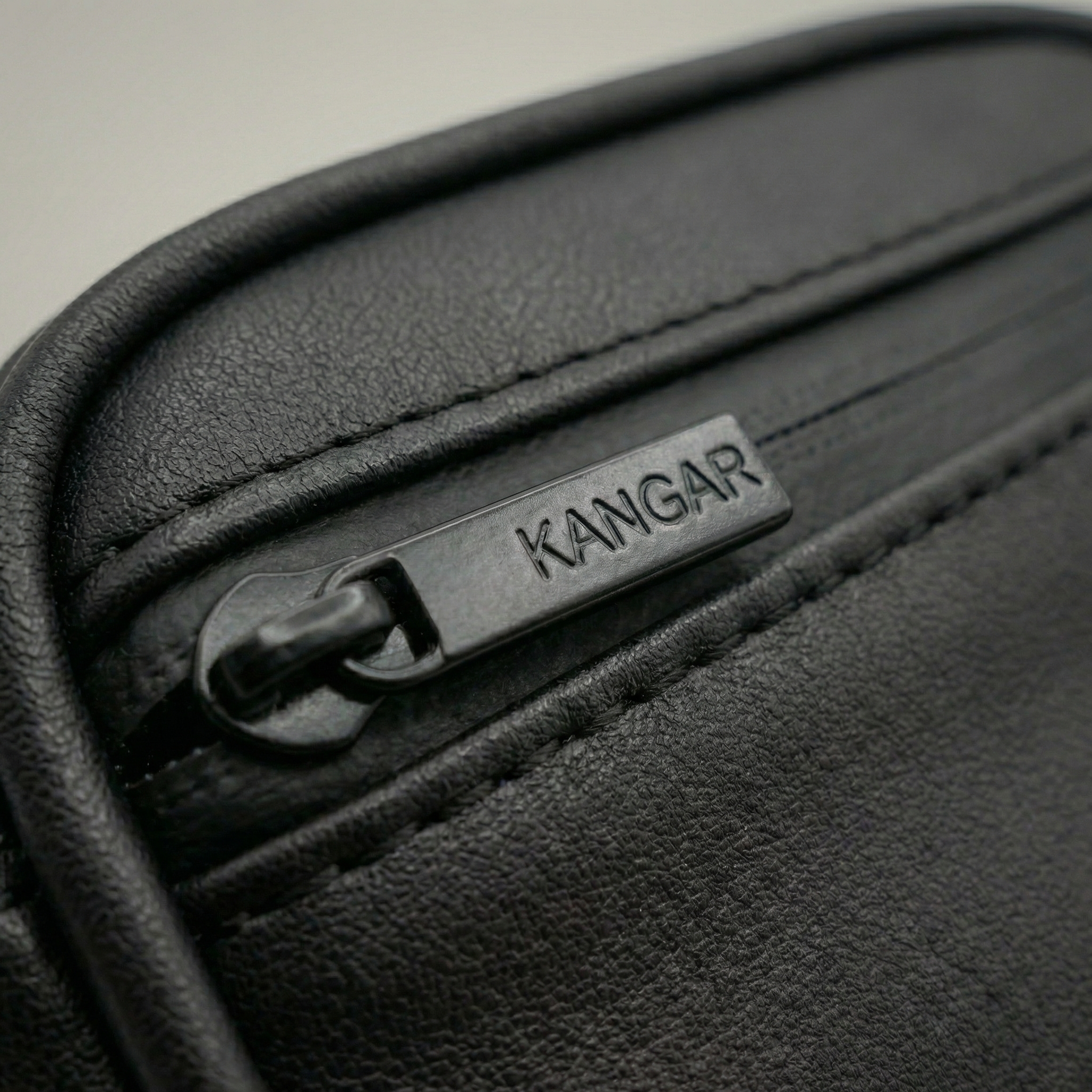 Detachable utility pouch with waterproof zipper and logo patch