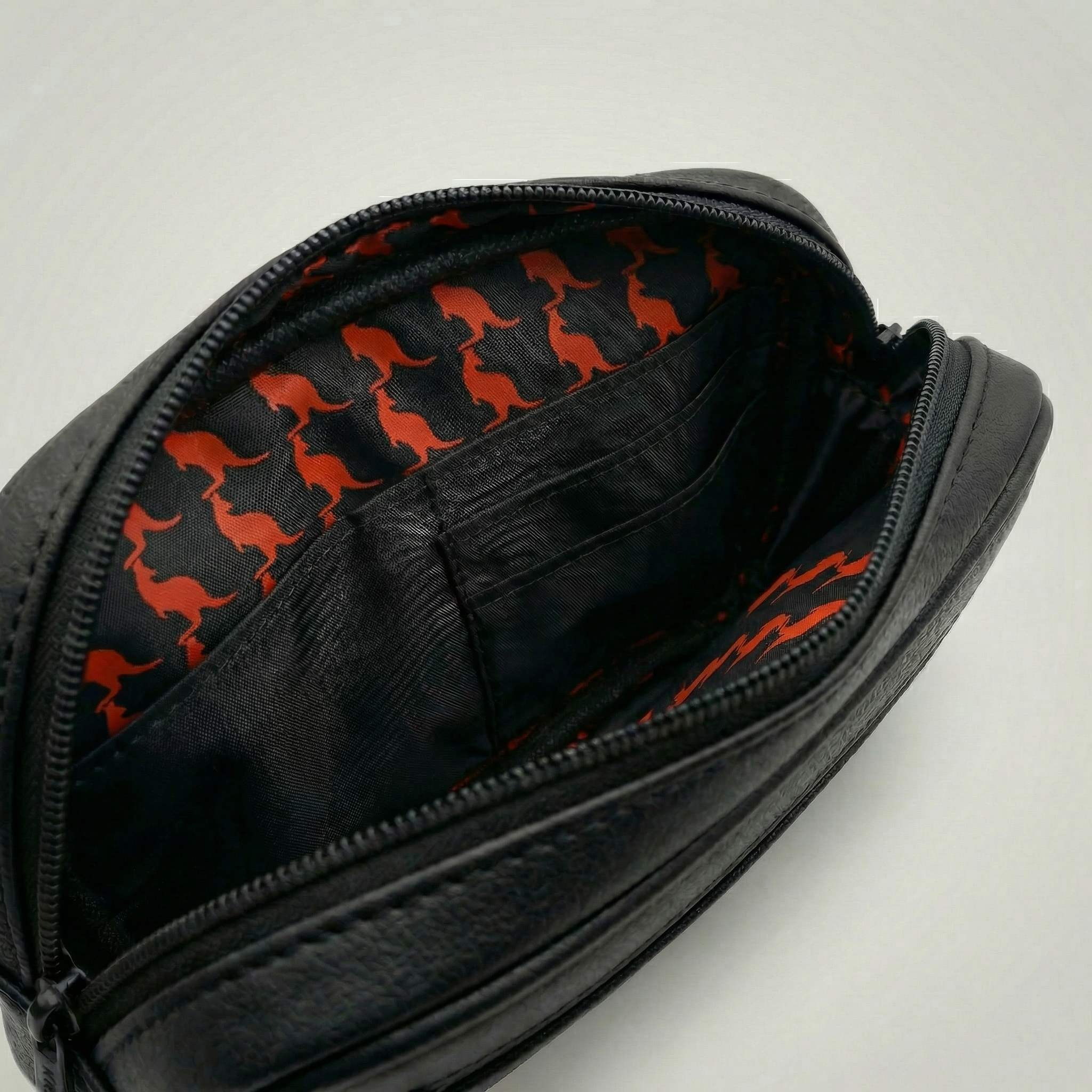 Detachable utility pouch with waterproof zipper and logo patch