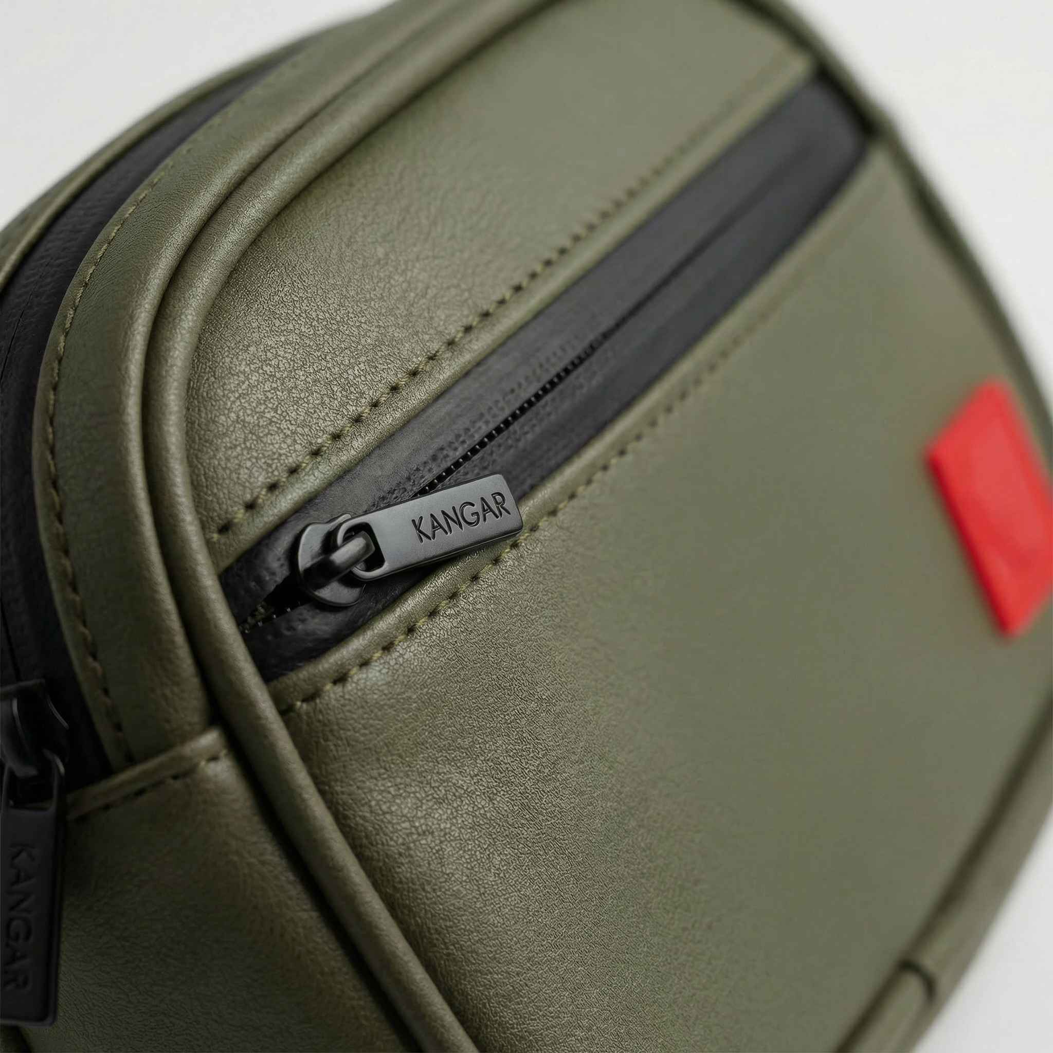 Detachable utility pouch with waterproof zipper and logo patch